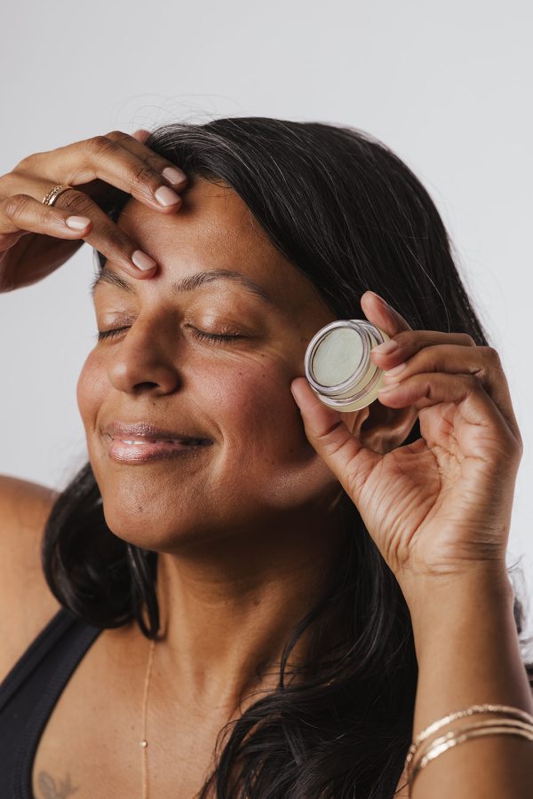 Brahmi Skincare Whistler 11:11 Magic Balm Lily's Applying To Forehead