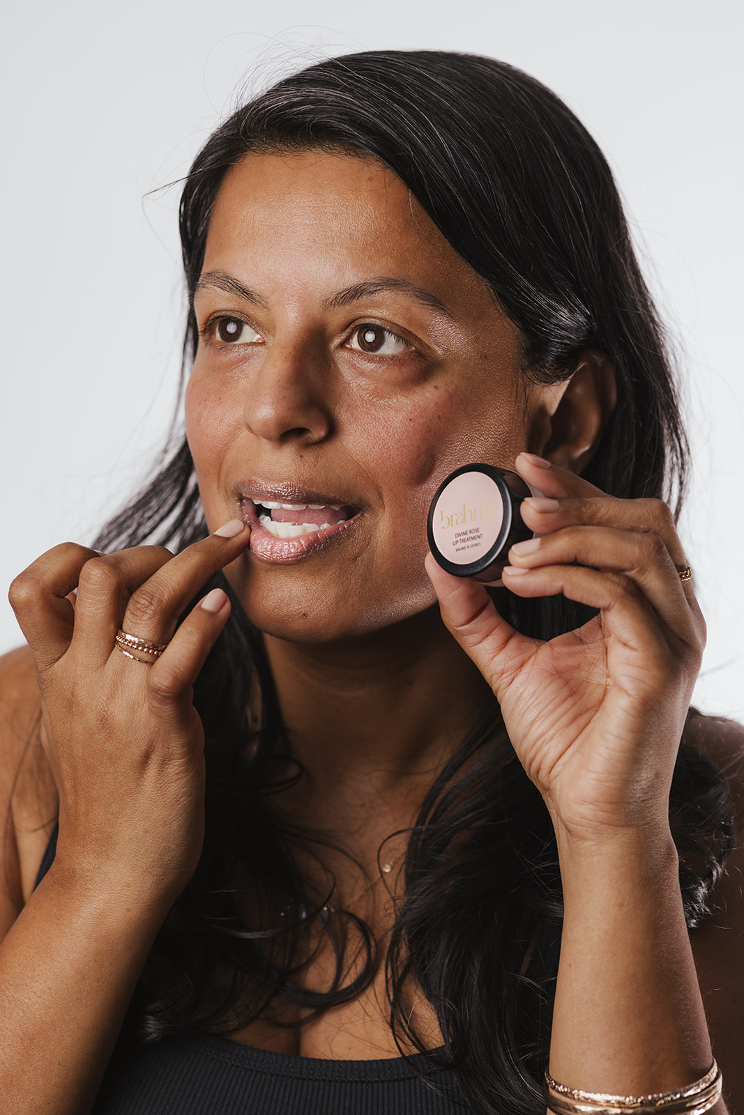 Brahmi Skincare Whistler Divine Rose Lip Plumping Balm Lily Applying Brahmi Skincare Whistler Divine Rose Lip Plumping Balm Lily Applying